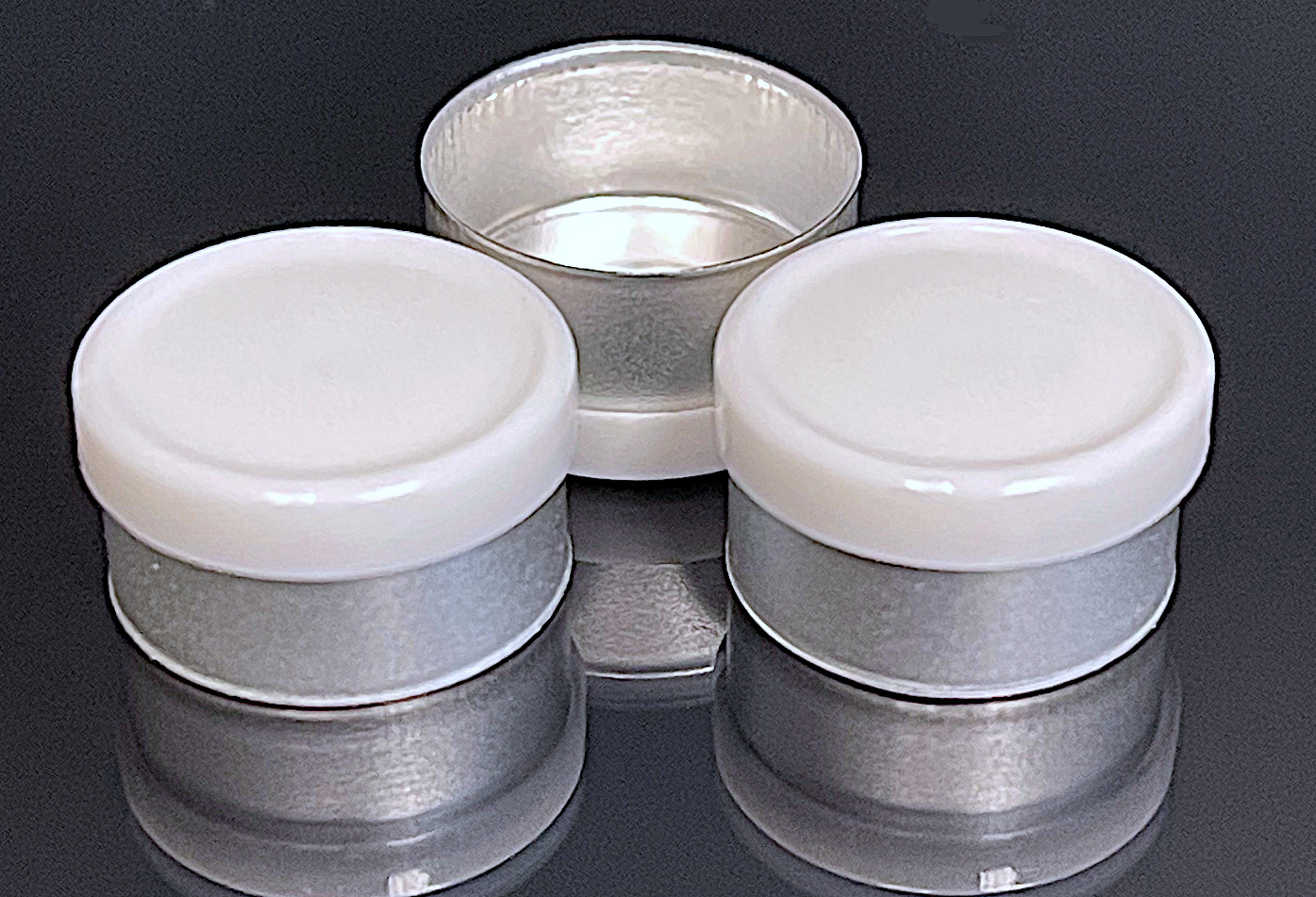 West Pharmaceutical 13mm smooth gloss flip cap seals for peptide vial packaging